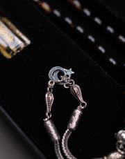 sarı siyah - ay yıldız 7.5 mm  sıkma kehribar 33 lü tesbih ve esans seti ( beyzi ) 2